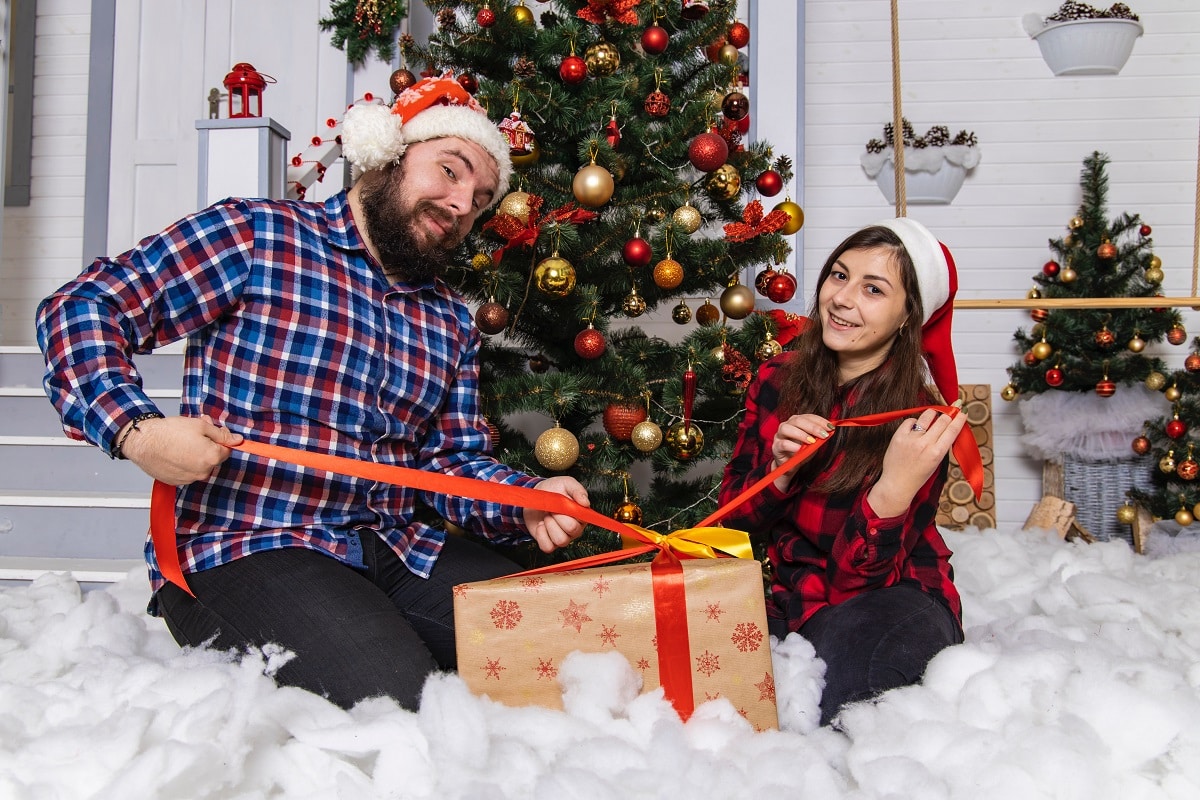 Christmas Couple Photoshoot Idea Wrapping Presents