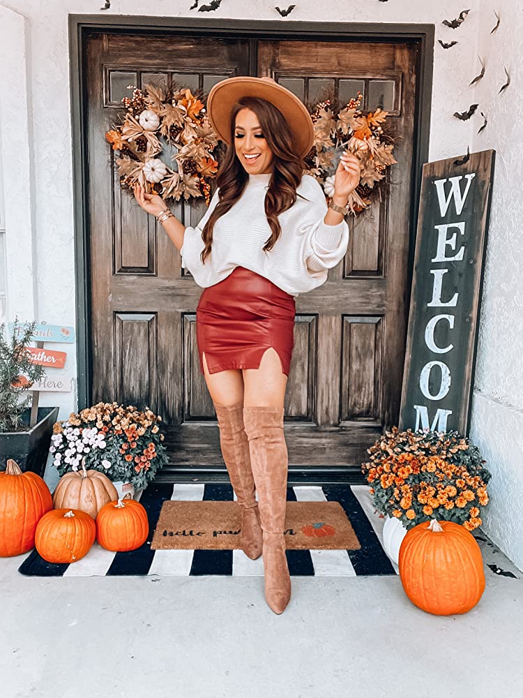 Cute Thanksgiving Outfit with a Red skirt, sweater, and hat