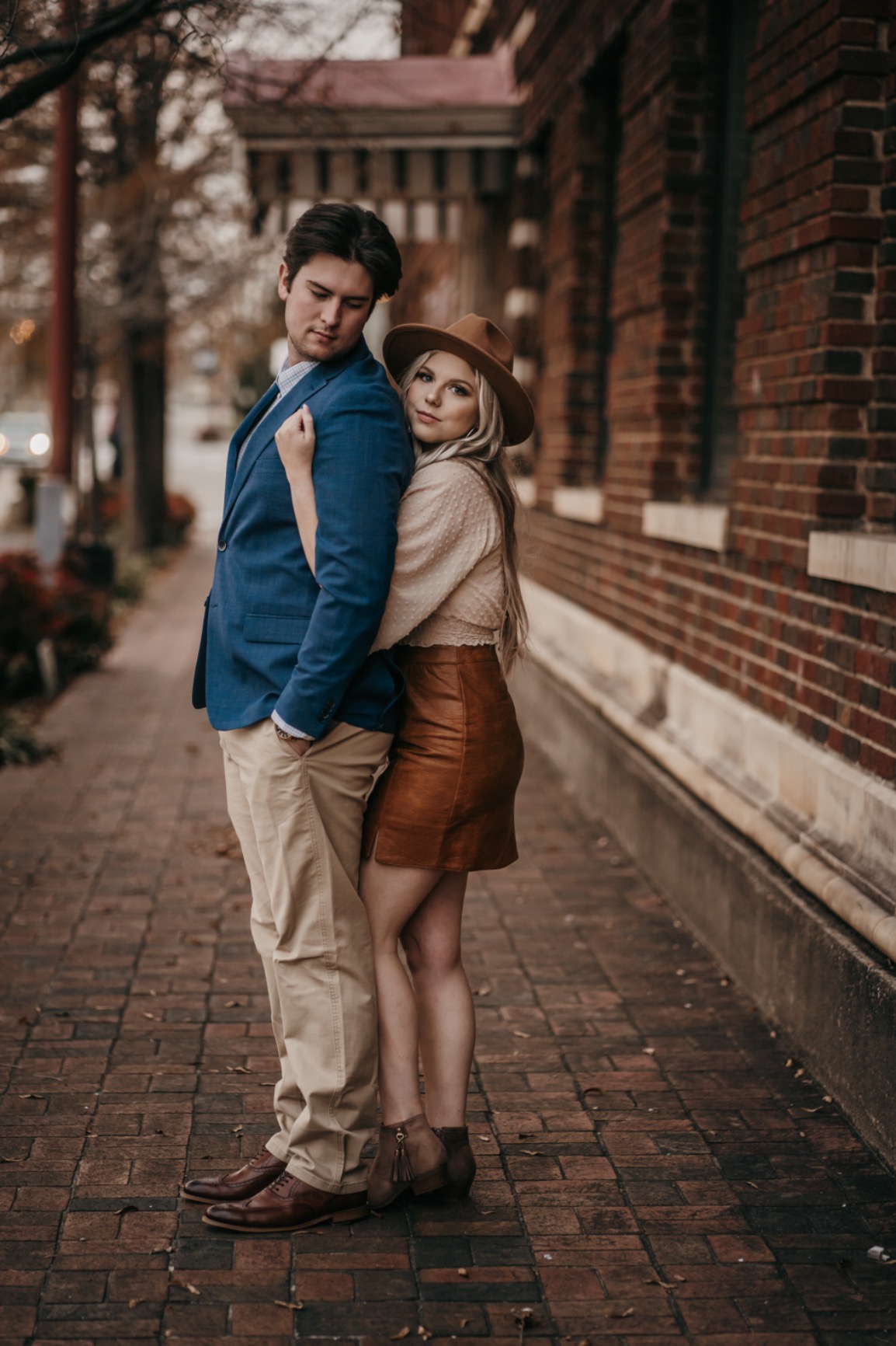 Fall Engagement Photo Outfit Idea with Leather Skirt and Hat