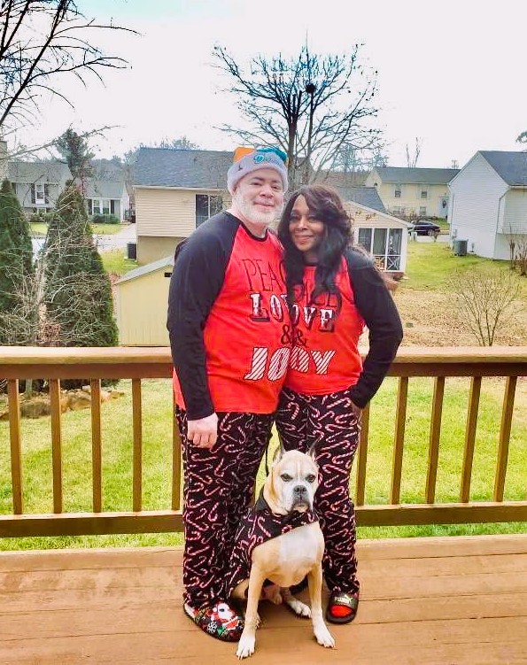 family and dog matching family Christmas pajamas Candy Canes