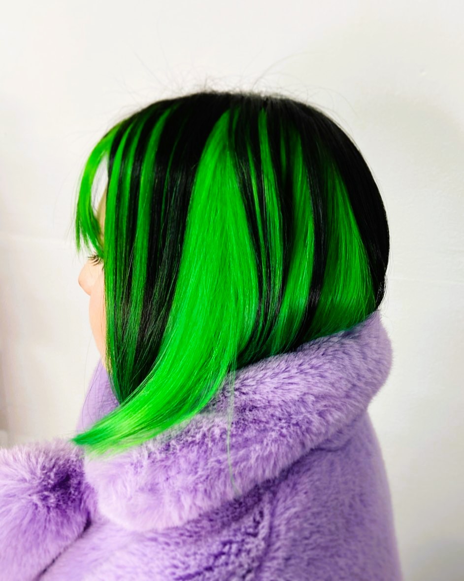 Short Black and Green Hair with Green Highlights