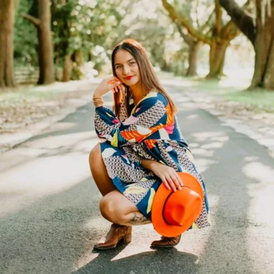 fall outfit from Amazon with cowboy boots and dress