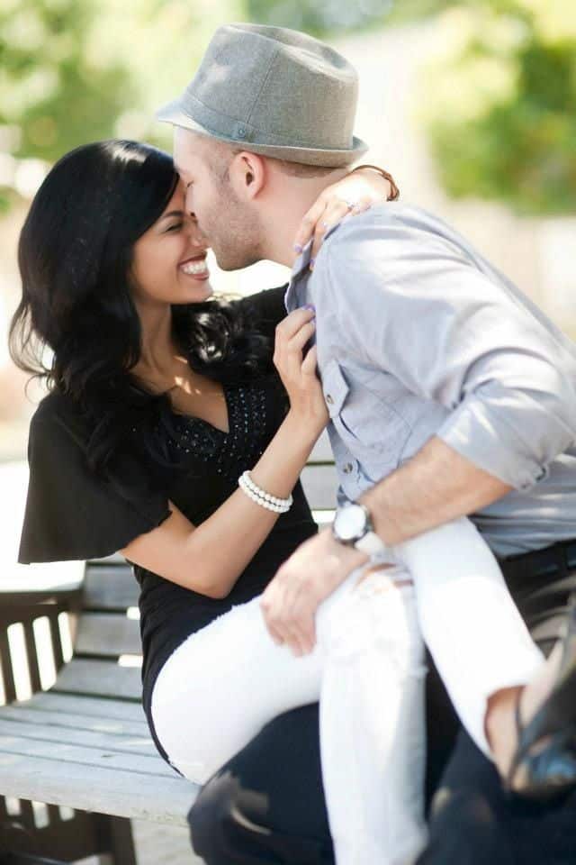spring engagement photo idea on park bench