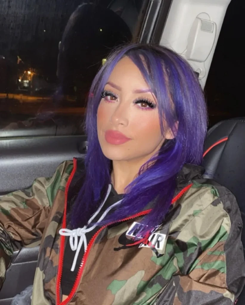 purple hair with side bangs and purple eyebrows