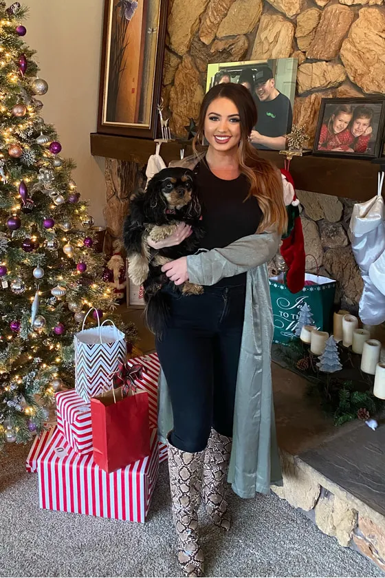 casual Christmas outfit with snakeskin boots