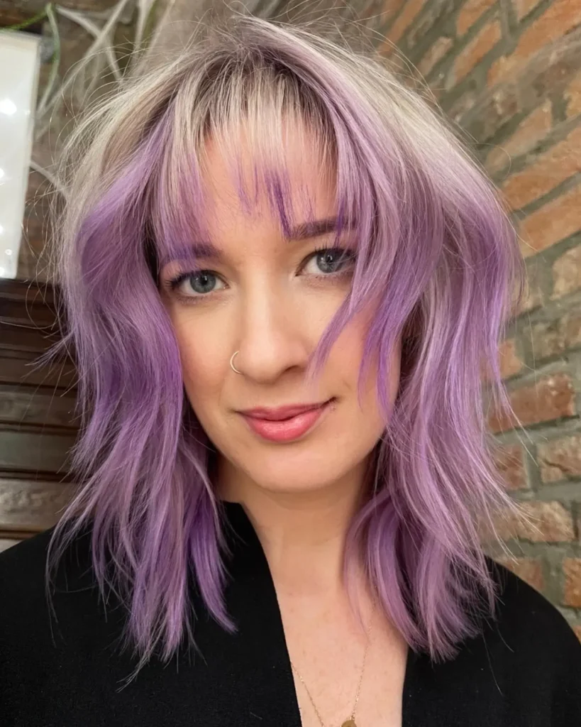 blonde and purple hair with bangs