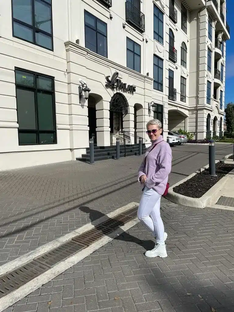platinum blonde in lavender sweater