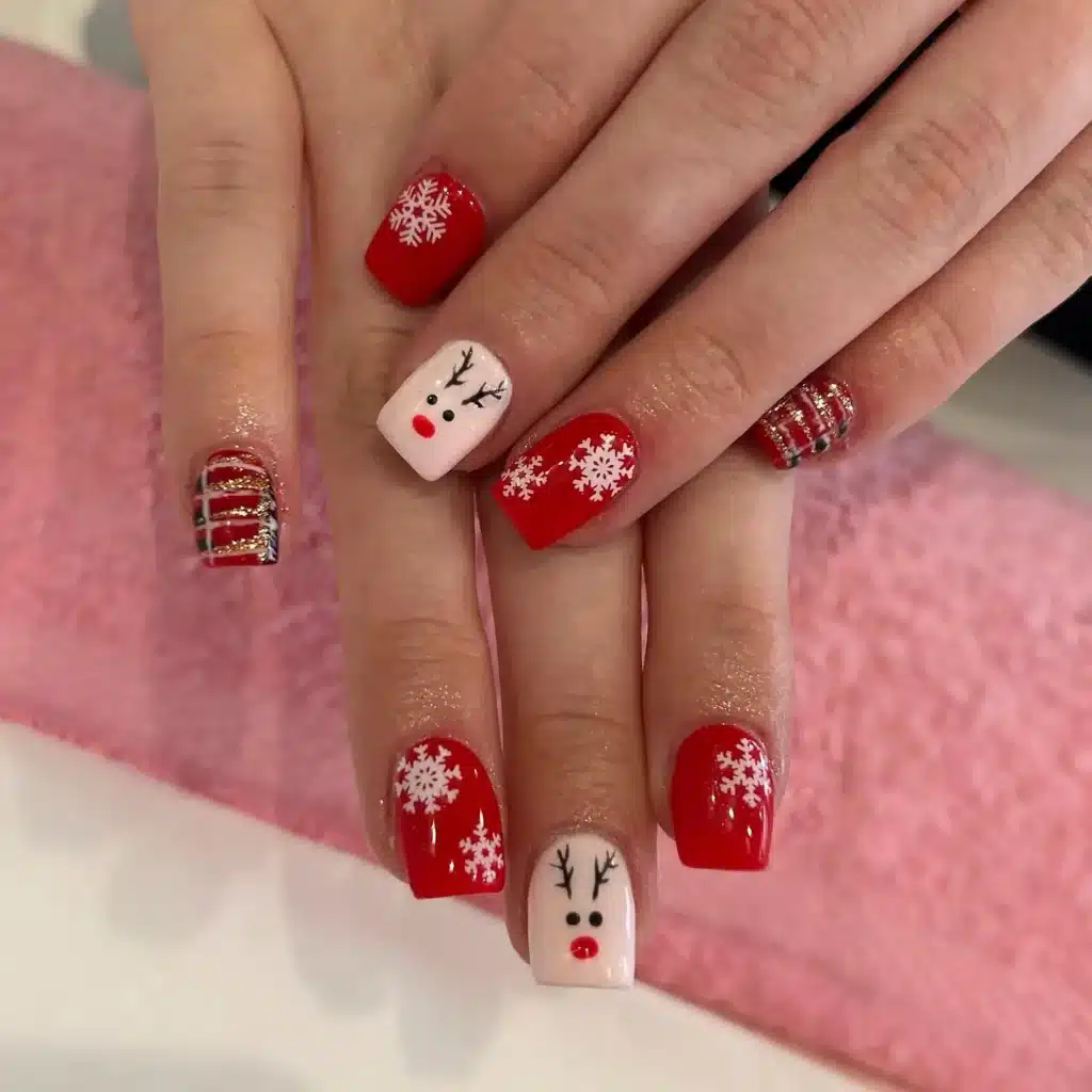 short reindeer and snowflake nails