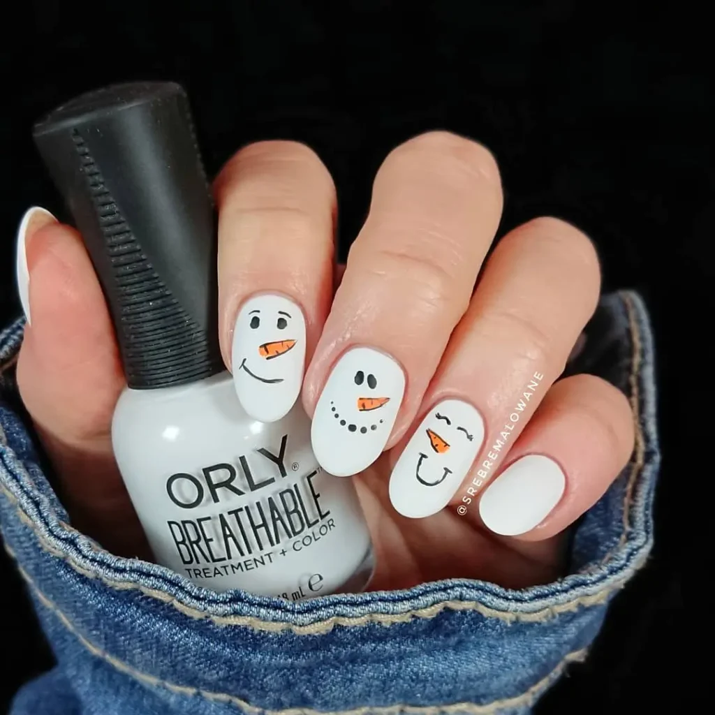 smiling snowman nails